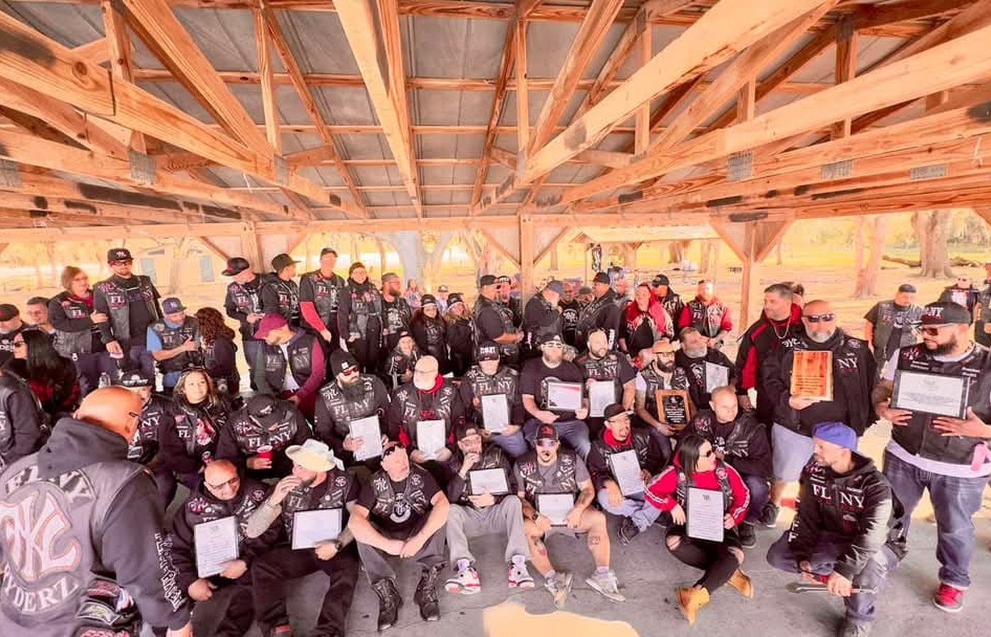 Large FLNY Ryderz group under a pavilion